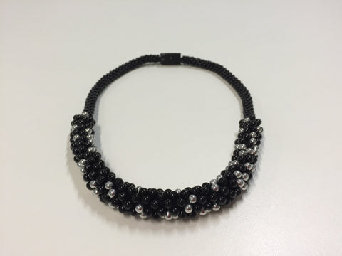 Beautiful hand-crafted necklace - colour of onyx with silver mercury highlights